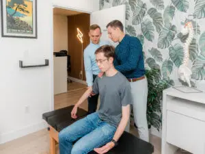 Dr. Alex Ritza explaining chiropractor costs in Toronto